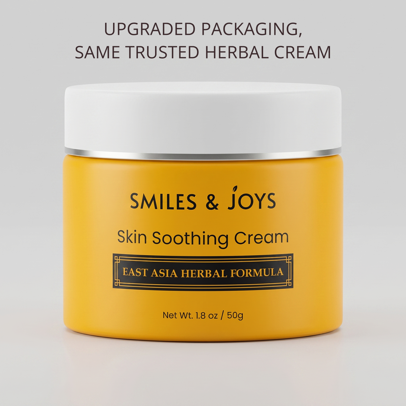 Yellow jar of 'Smiles & Joys' skin soothing cream with white lid on a light gray background.